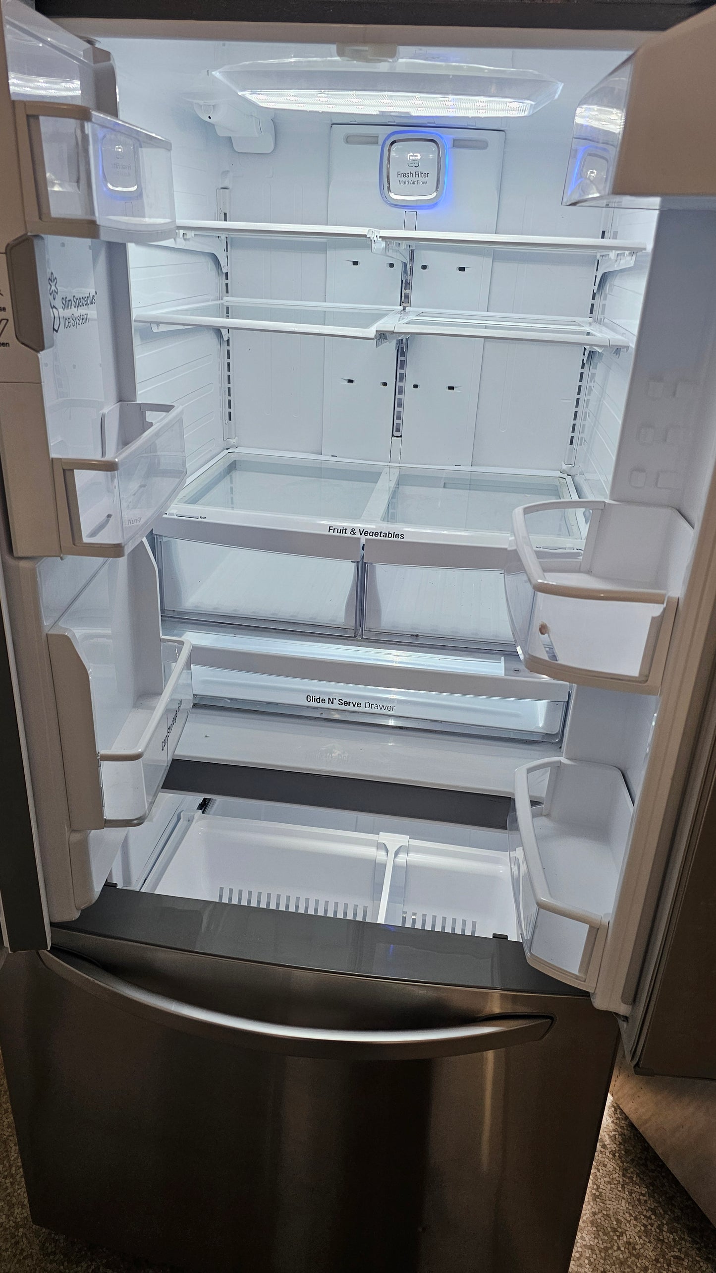 Réfrigérateur à porte française LG avec machine à eau et à glace - SKU#1682 en acier inoxydable